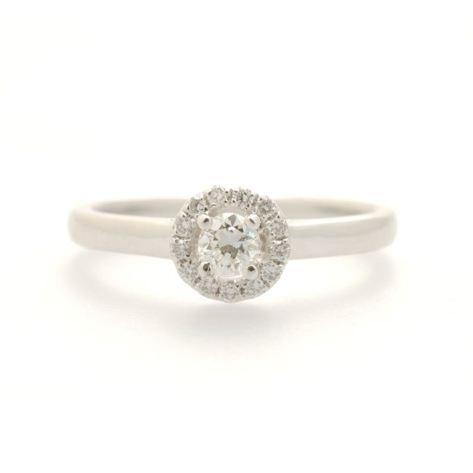 0.18 Carat Platinum and Diamond Halo Ring