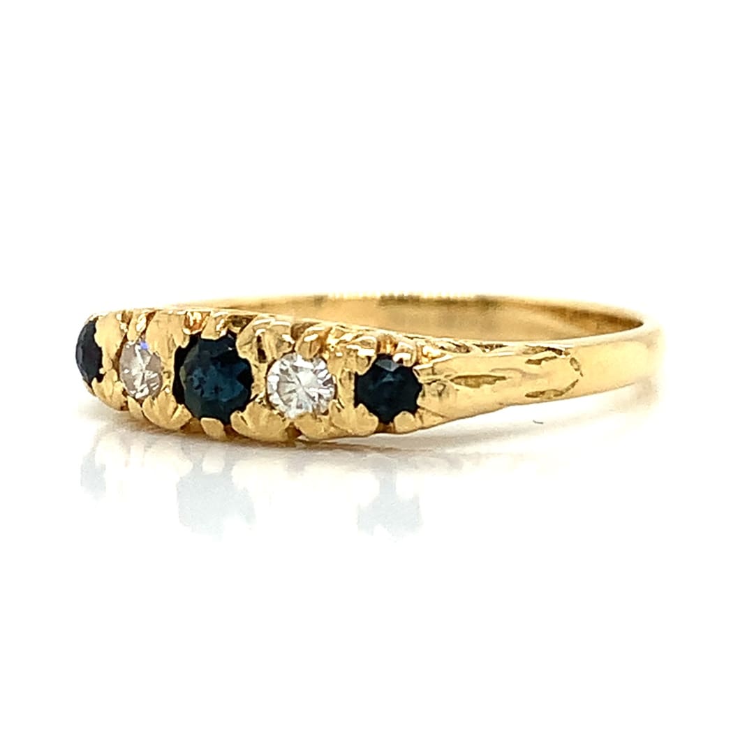 Sapphire and Diamond 18ct Carve Ring