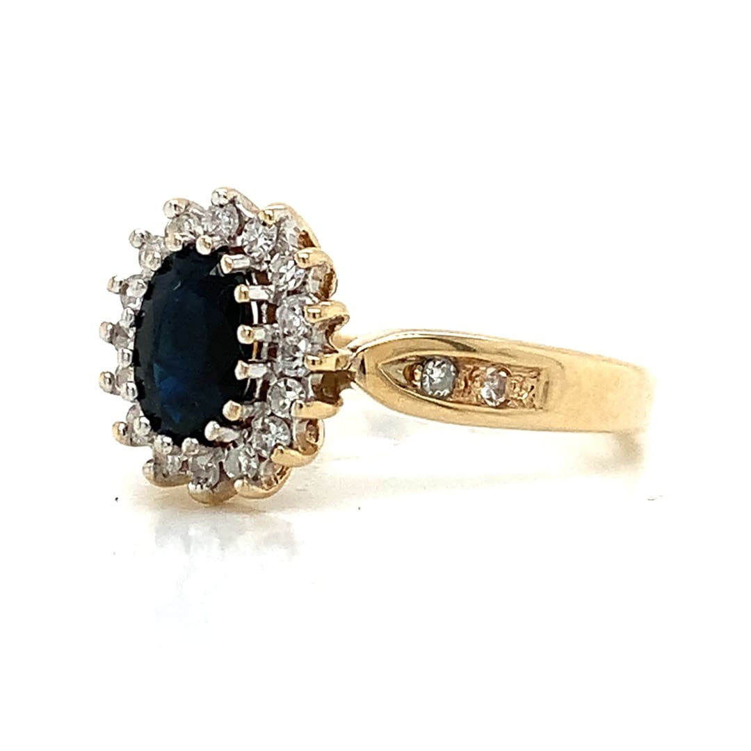 Oval Sapphire and Diamond Cluster Ring