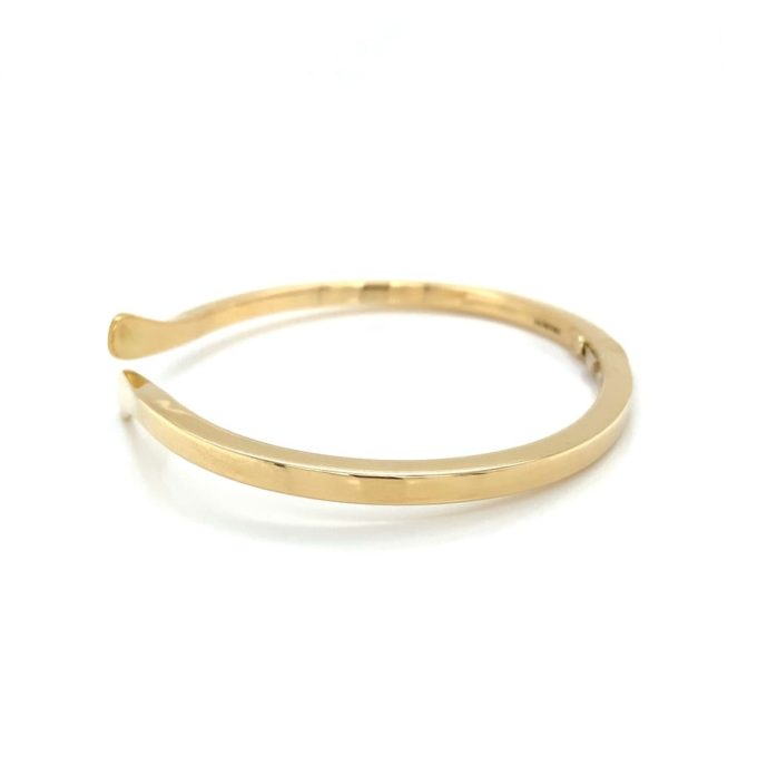 18 Carat Gold Crossover Hinged Bangle