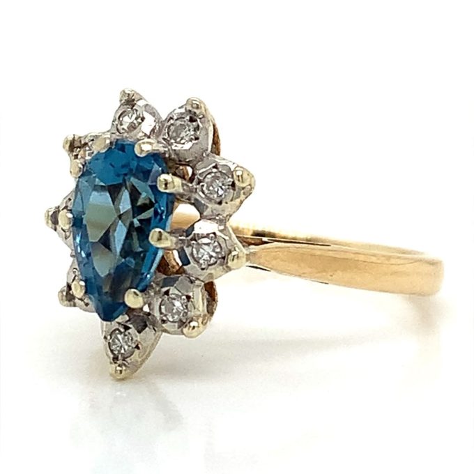 Pear Cut Blue Topaz and Diamond Cluster Ring