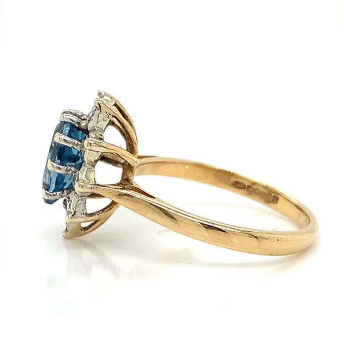 Pear Cut Blue Topaz and Diamond Cluster Ring
