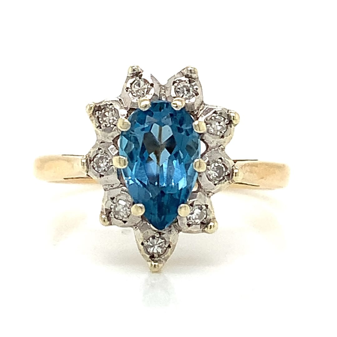Pear Cut Blue Topaz and Diamond Cluster Ring