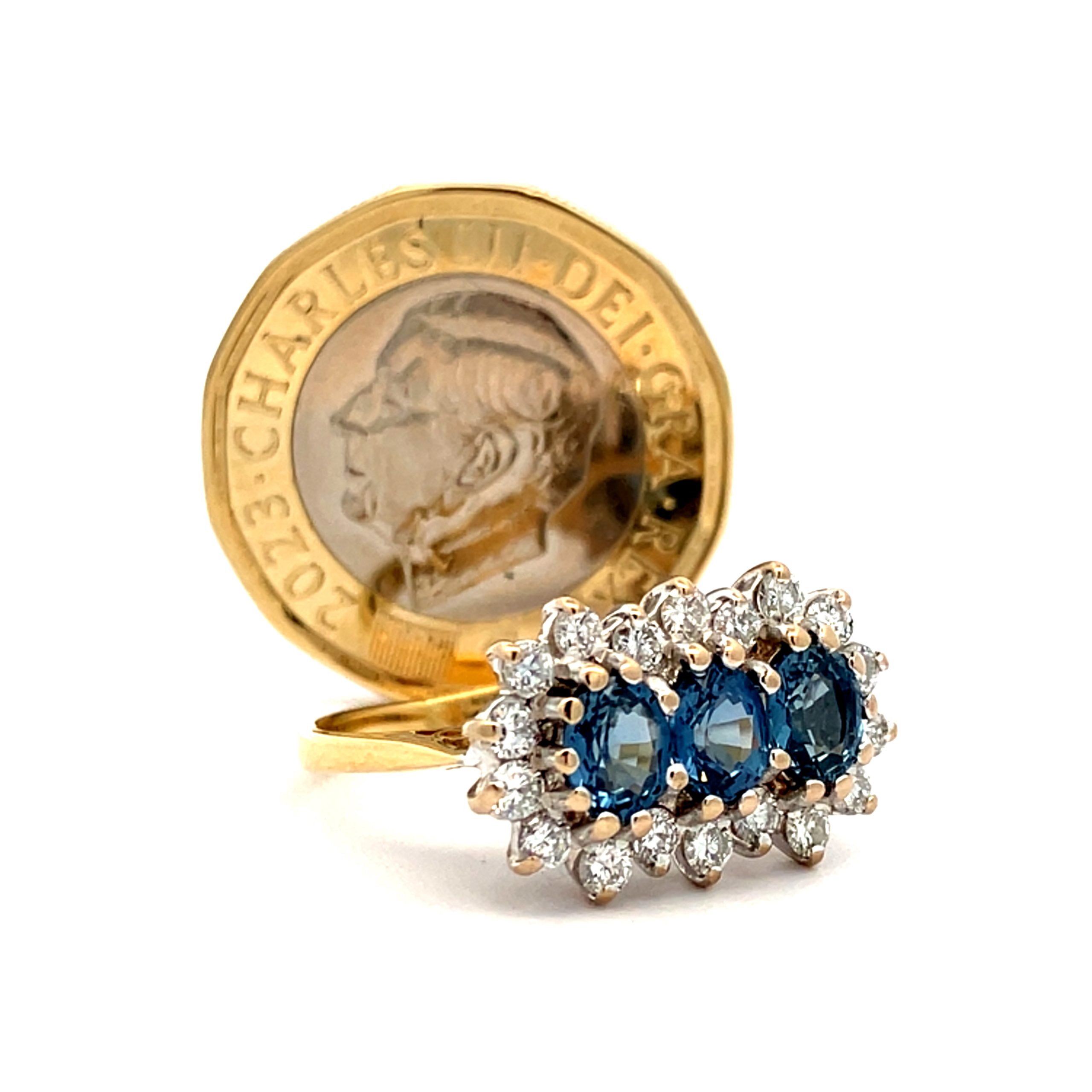 Striking Diamond Framed Blue Sapphire Trilogy Dress Ring